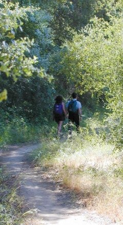 Ron and Les walking home after a day swimming